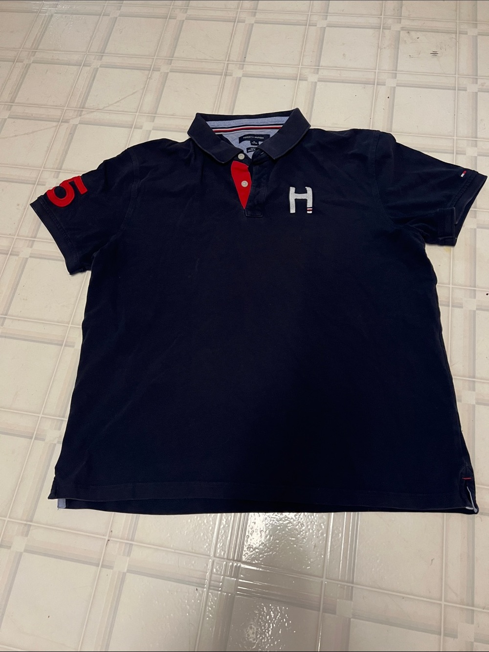 Tommy Hilfiger Navy Polo with Red Placket and Sleeve Detail